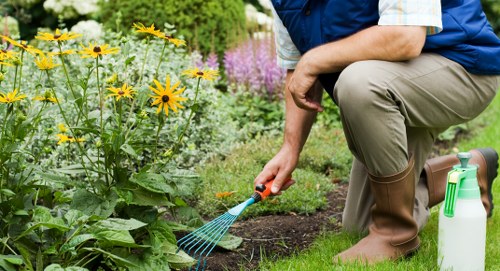 Crew using PPE during garden maintenance